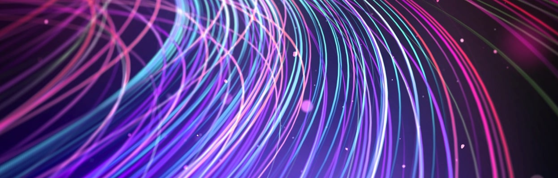 A purple and blue background with lines of light